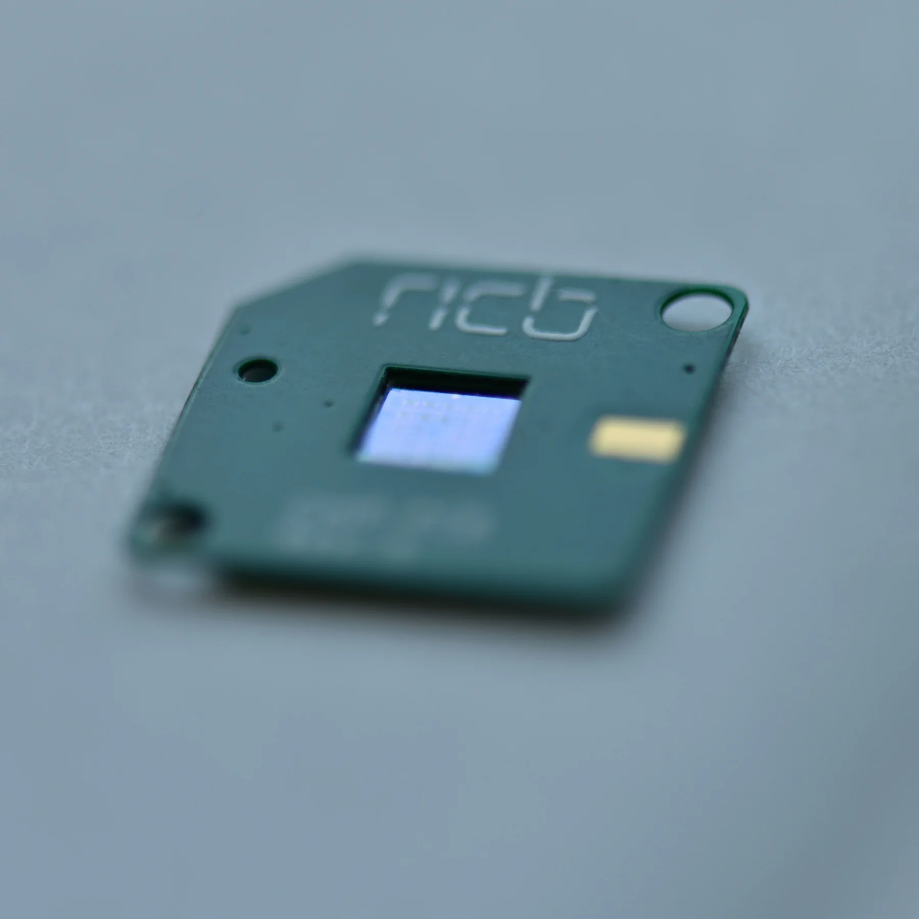 Macro photograph of a physical green sensor board